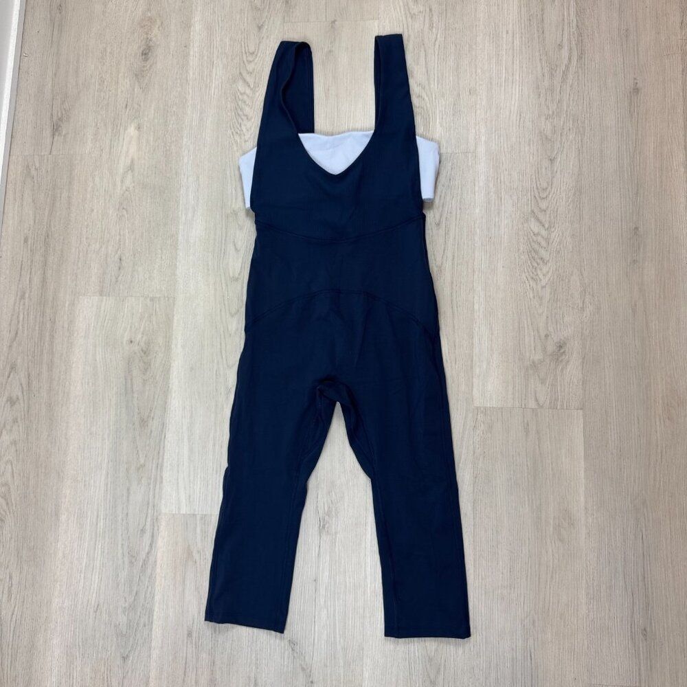 Free People Movement Shes A Maniac One Piece Jumpsuit Size XS Blue Navy NEW